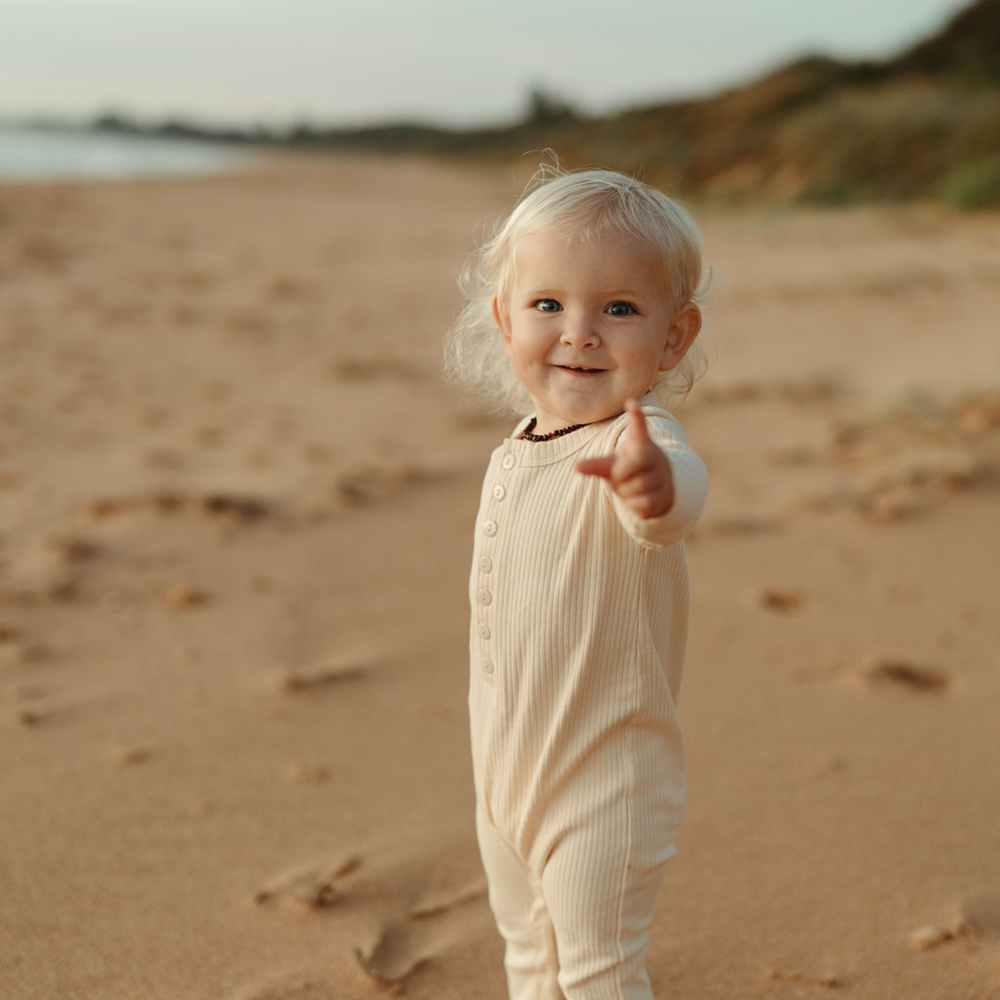 Organic full length jumpsuit ribbed cream natural baby toddler sustainable clothing byron bay brand Zaya and Kai