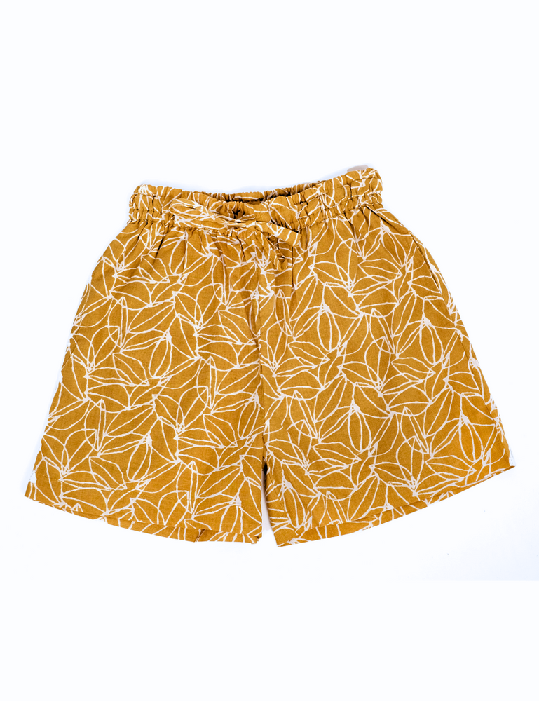 product photo of retro block printed shorts in mustard seed print