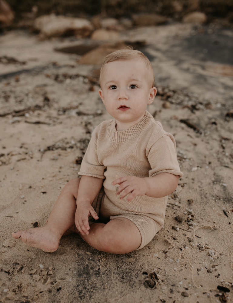 
                  
                    knitted oversized jumpsuit sand beige baby toddler sustainable clothing byron bay brand Zaya and Kai
                  
                