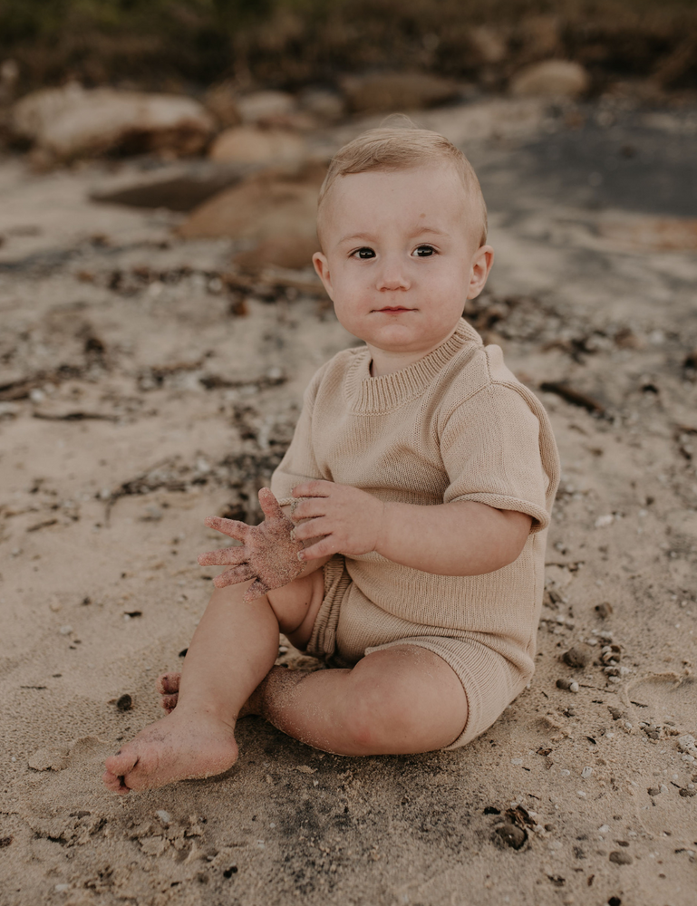 
                  
                    knitted oversized jumpsuit sand beige baby toddler sustainable clothing byron bay brand Zaya and Kai
                  
                