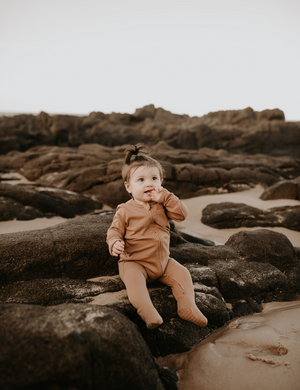 
                  
                    organic footed jumpsuit with double zip fawn natural baby toddler sustainable clothing byron bay brand Zaya and Kai
                  
                