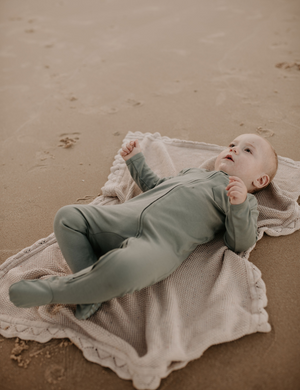 
                  
                    organic footed jumpsuit with double zip steel natural baby toddler sustainable clothing byron bay brand Zaya and Kai
                  
                