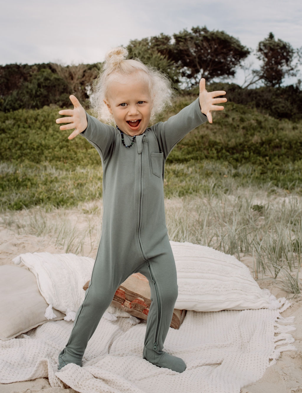 
                  
                    organic footed jumpsuit with double zip steel natural baby toddler sustainable clothing byron bay brand Zaya and Kai
                  
                