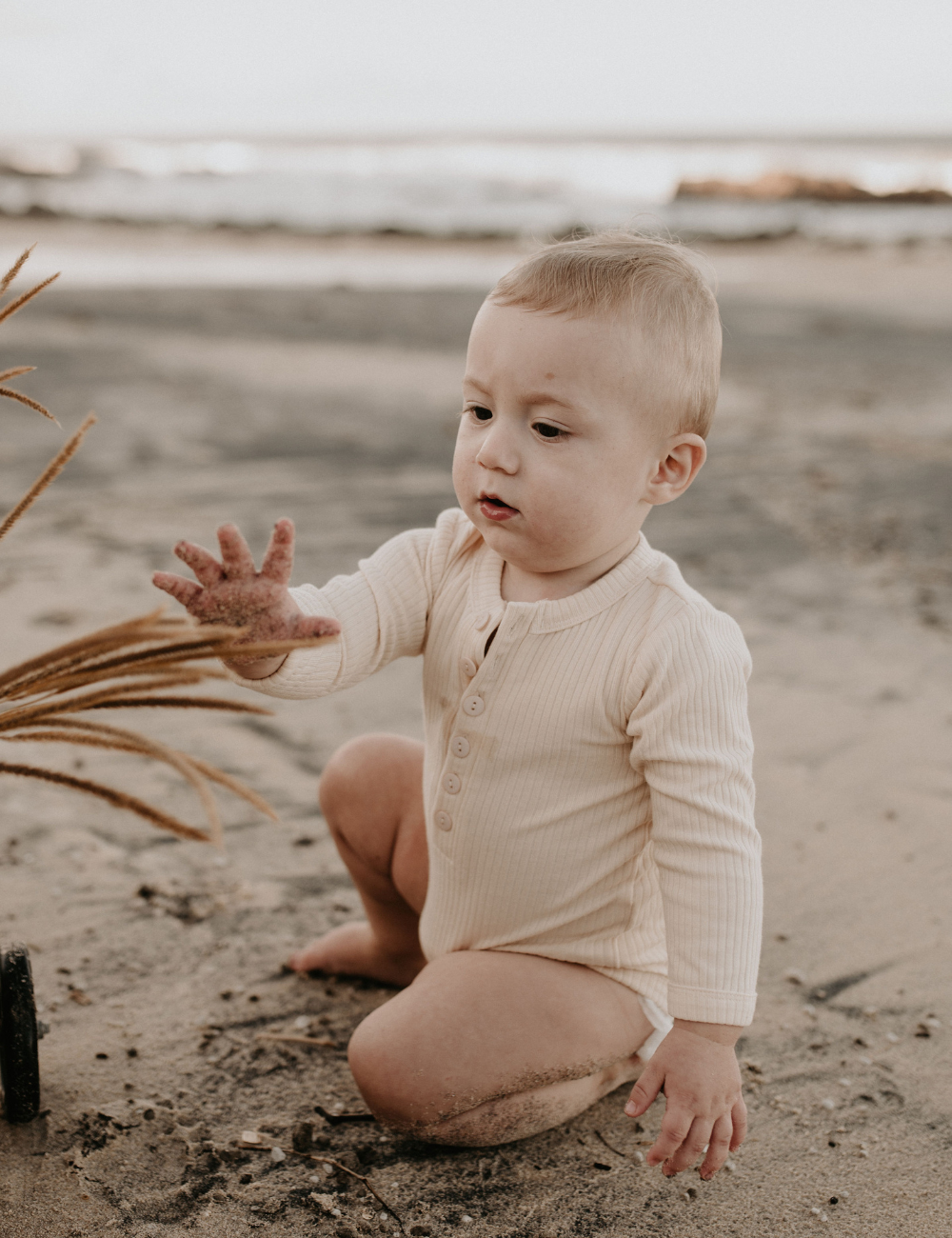 
                  
                    organic long sleeved romper ribbed cream natural baby toddler sustainable clothing byron bay brand Zaya and Kai
                  
                